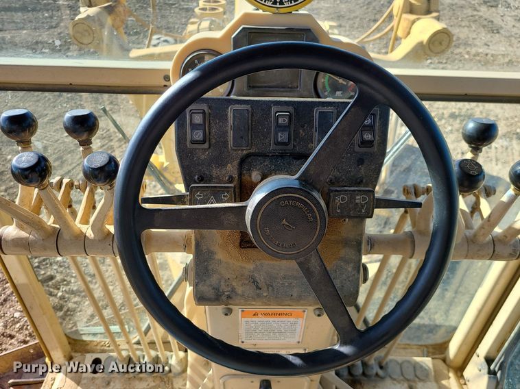 image for item MX9601 1999 Caterpillar 140H  motor grader