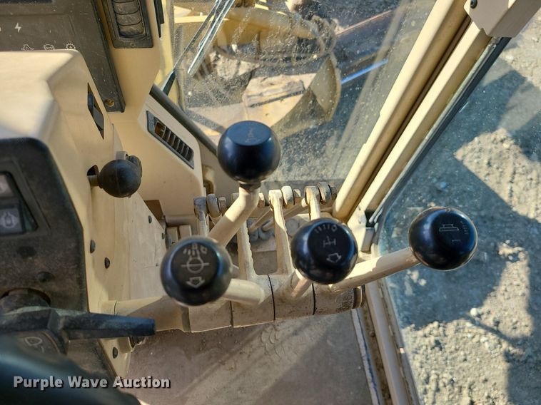 image for item MX9601 1999 Caterpillar 140H  motor grader