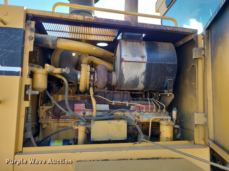 image for item MX9601 1999 Caterpillar 140H  motor grader