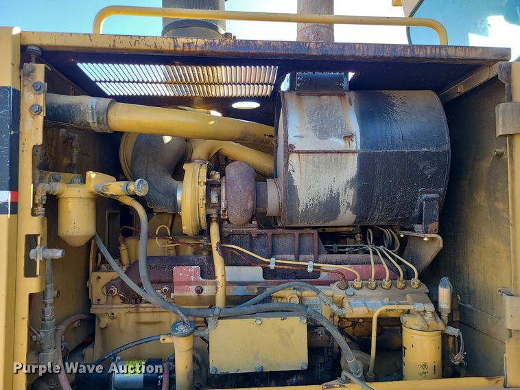 image for item MX9601 1999 Caterpillar 140H  motor grader