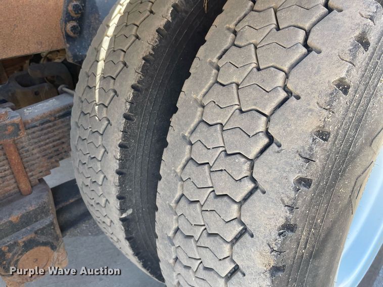 image for item MY9244 2007 Freightliner Business Class M2  roll-off container truck