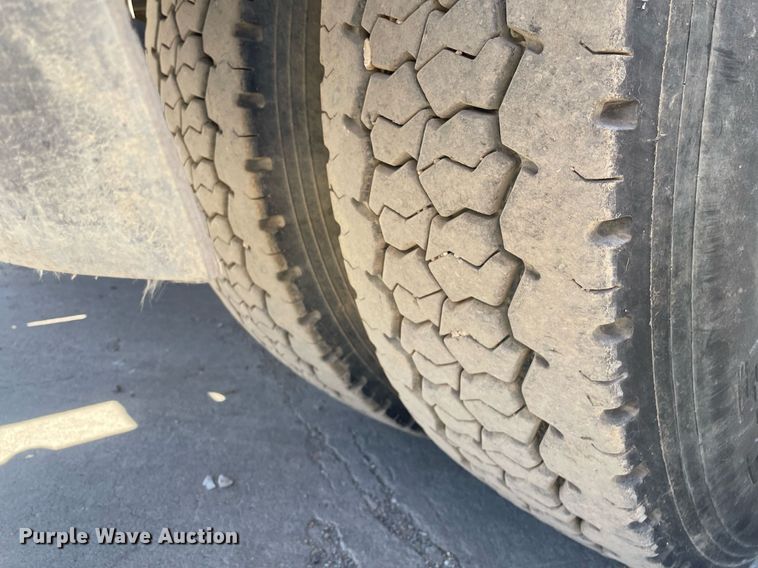 image for item MY9244 2007 Freightliner Business Class M2  roll-off container truck