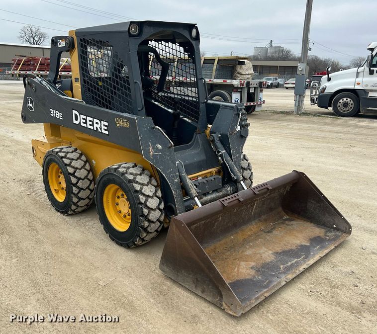 image for item MY9555 2015 John Deere 318E  skid steer loader