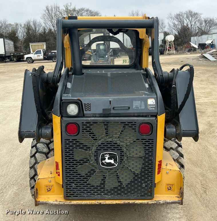 image for item MY9555 2015 John Deere 318E  skid steer loader