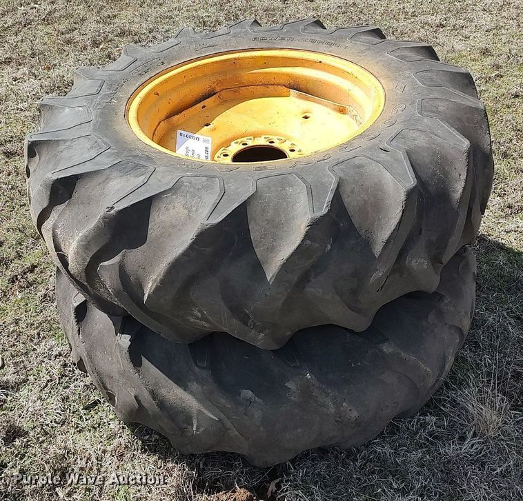 image for item DO3910 (2) 14.9-24 tires and wheels