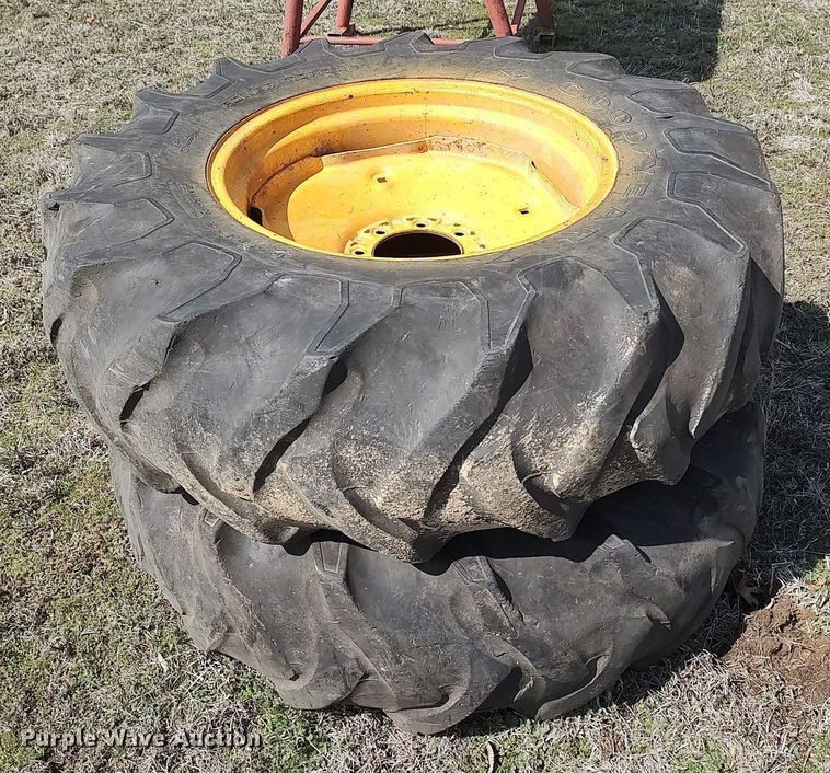 image for item DO3910 (2) 14.9-24 tires and wheels