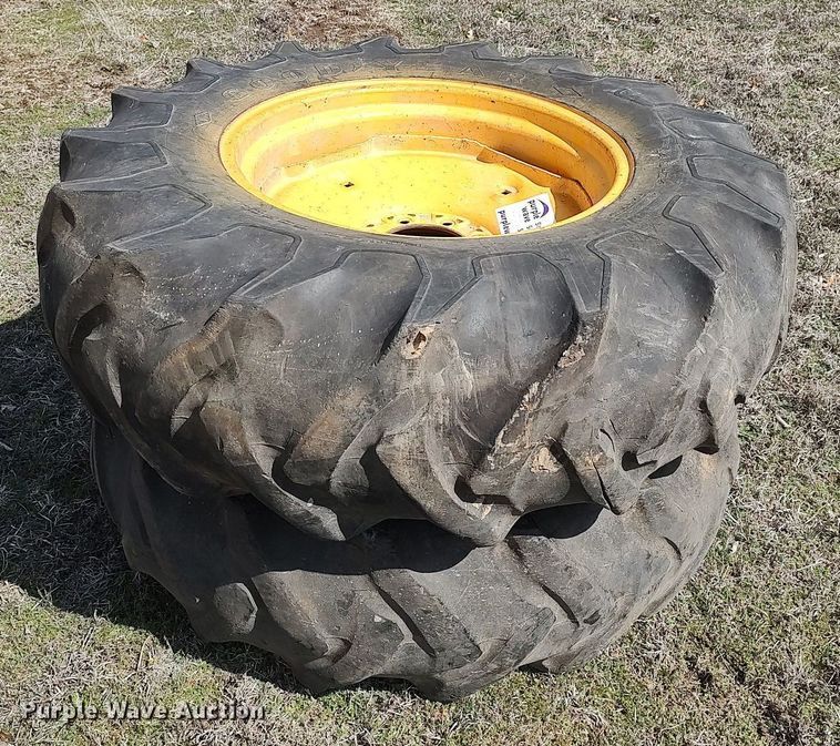 image for item DO3910 (2) 14.9-24 tires and wheels