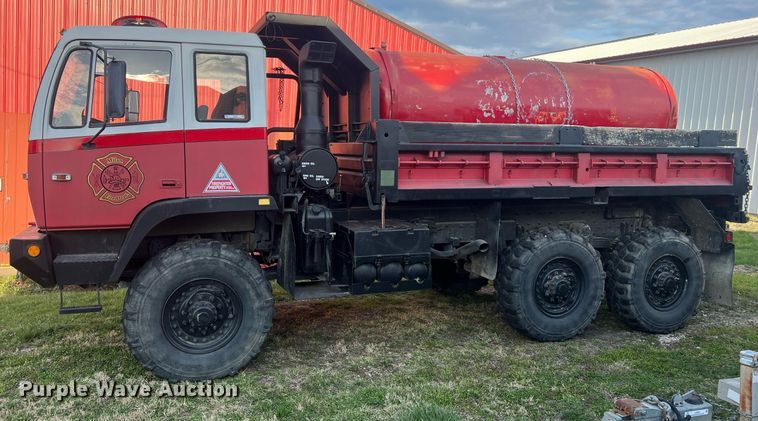 image for item LI9583 1999 Stewart & Stevenson MTV M-1090  dump truck