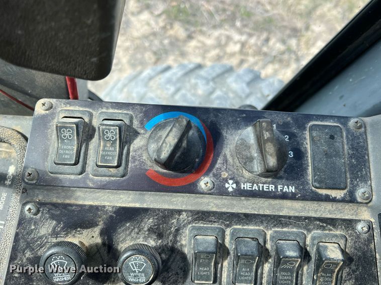 image for item LI9586 1997 Champion 710A Series IV  motor grader