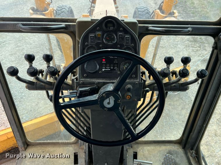 image for item LI9587 1999 Champion 710A Series V VHP  motor grader