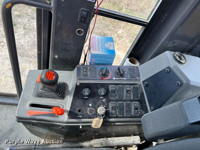 image for item LI9587 1999 Champion 710A Series V VHP  motor grader