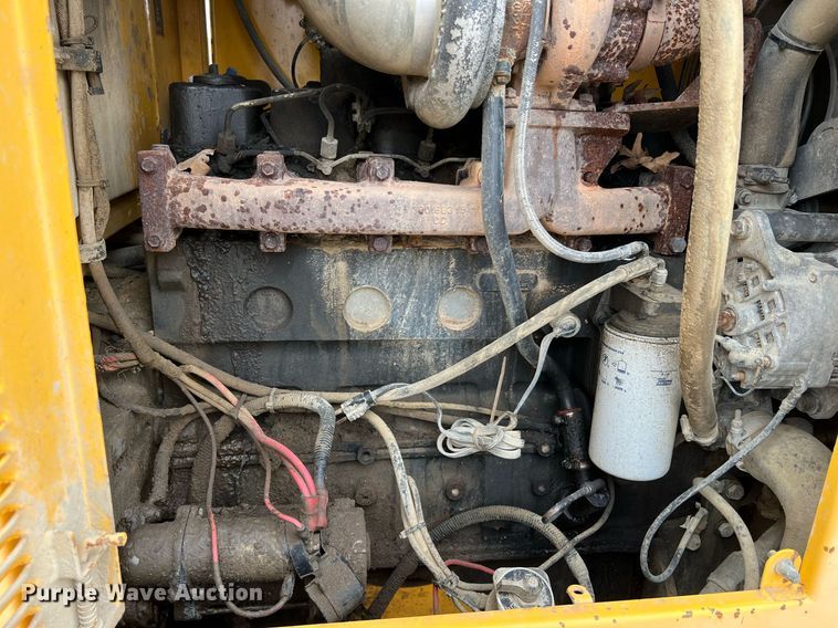 image for item LI9587 1999 Champion 710A Series V VHP  motor grader