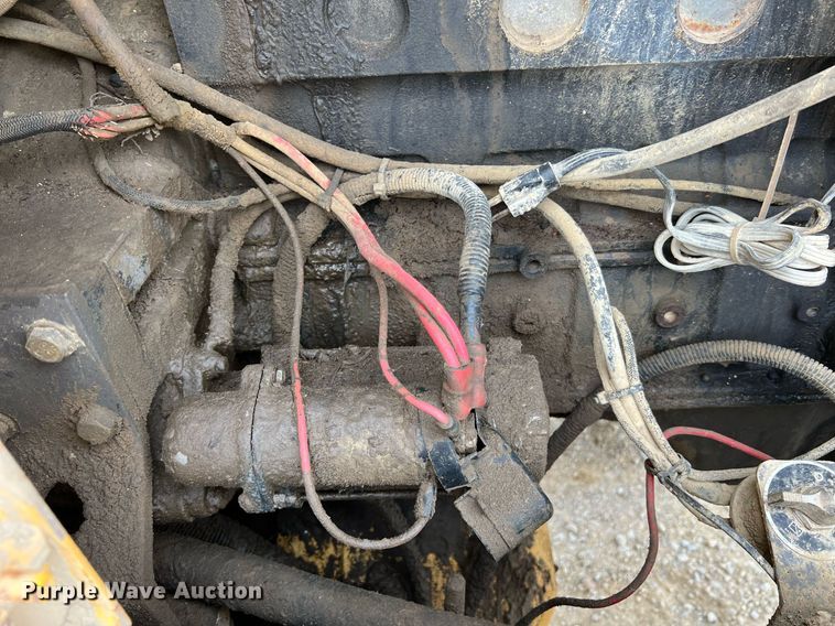 image for item LI9587 1999 Champion 710A Series V VHP  motor grader