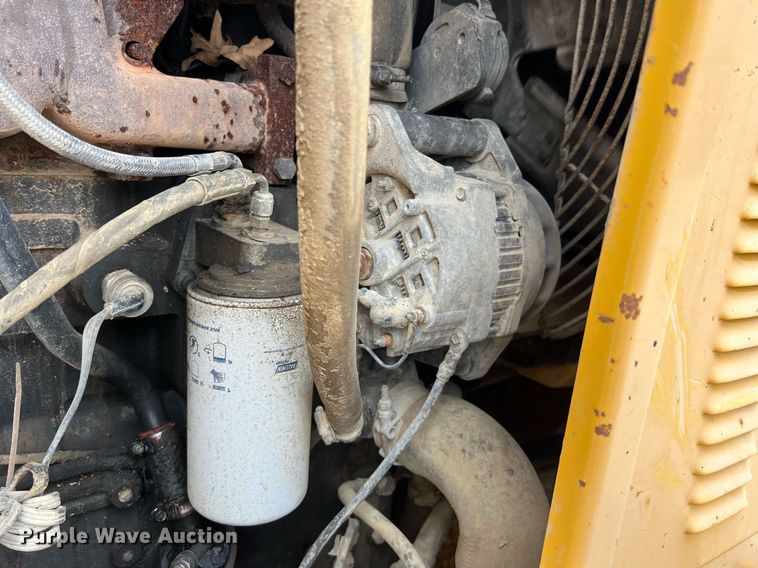 image for item LI9587 1999 Champion 710A Series V VHP  motor grader