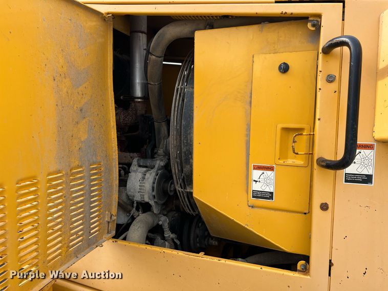image for item LI9587 1999 Champion 710A Series V VHP  motor grader