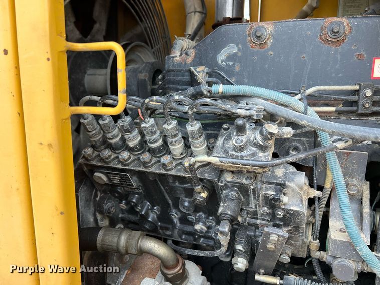 image for item LI9587 1999 Champion 710A Series V VHP  motor grader