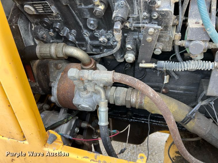 image for item LI9587 1999 Champion 710A Series V VHP  motor grader