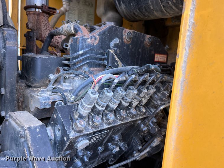 image for item LI9587 1999 Champion 710A Series V VHP  motor grader