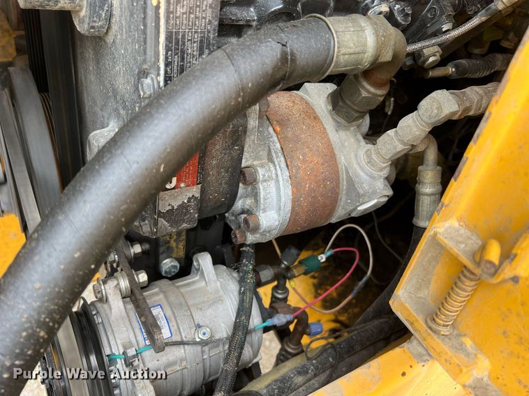 image for item LI9587 1999 Champion 710A Series V VHP  motor grader