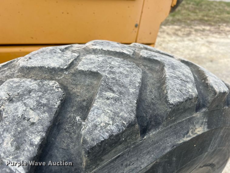 image for item LI9587 1999 Champion 710A Series V VHP  motor grader