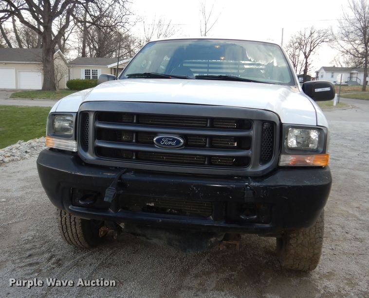 image for item MI9352 2002 Ford F350 Super Duty XL  Crew Cab flatbed pickup truck