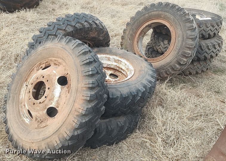 image for item DQ0453 (8) 9.00-20 tires and wheels