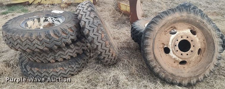 image for item DQ0453 (8) 9.00-20 tires and wheels