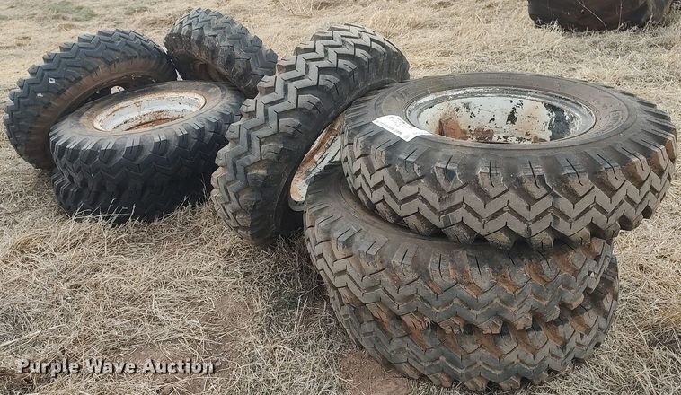 image for item DQ0453 (8) 9.00-20 tires and wheels