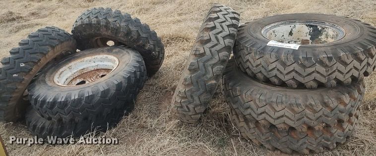 image for item DQ0453 (8) 9.00-20 tires and wheels