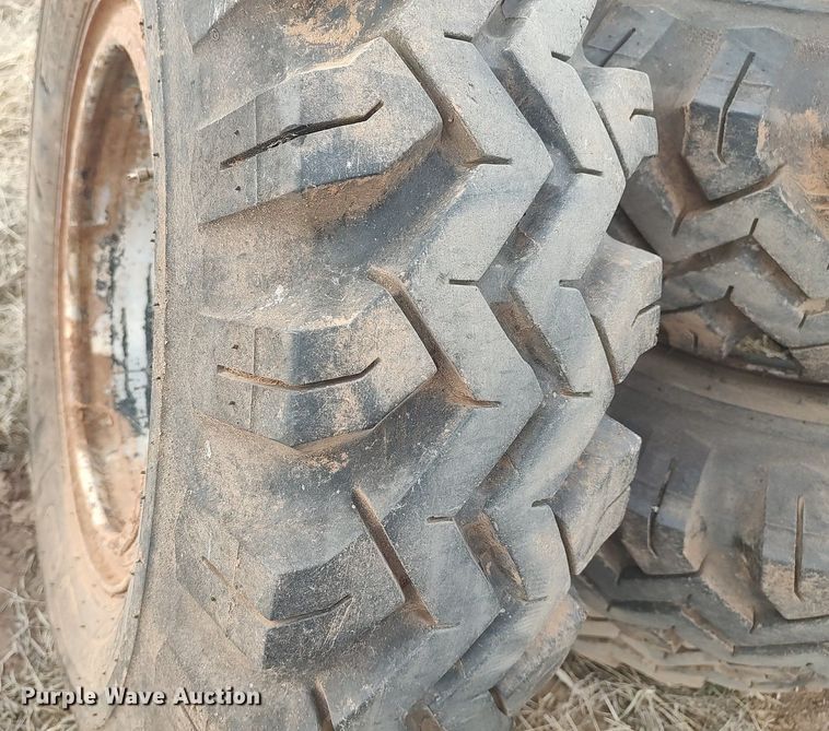 image for item DQ0453 (8) 9.00-20 tires and wheels