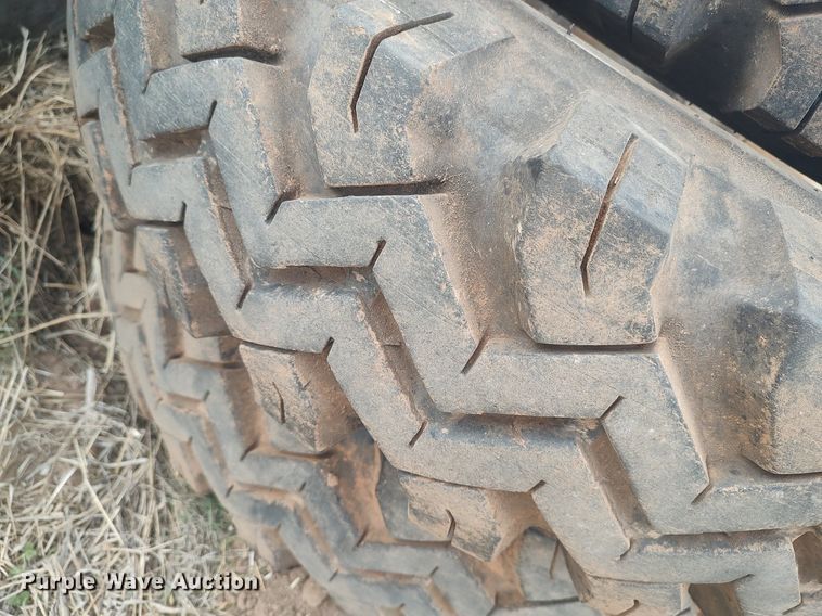 image for item DQ0453 (8) 9.00-20 tires and wheels