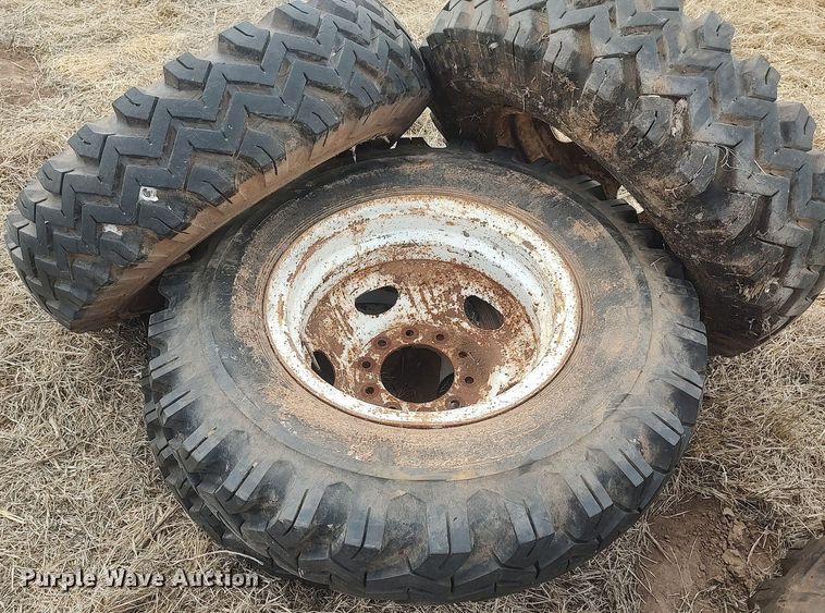 image for item DQ0453 (8) 9.00-20 tires and wheels