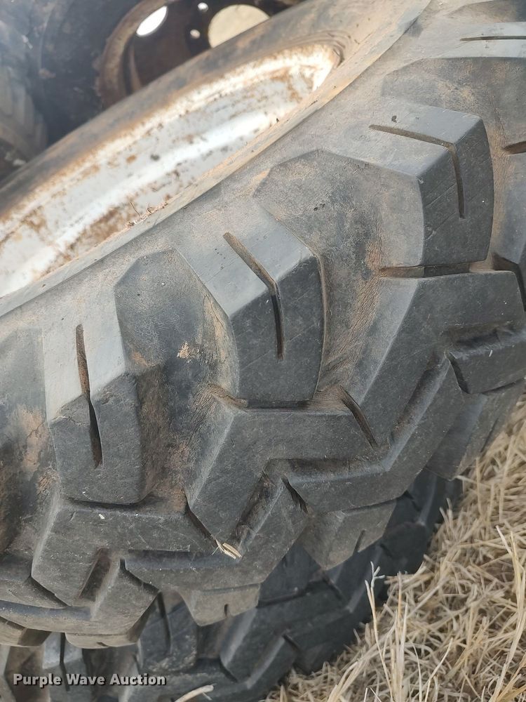 image for item DQ0453 (8) 9.00-20 tires and wheels