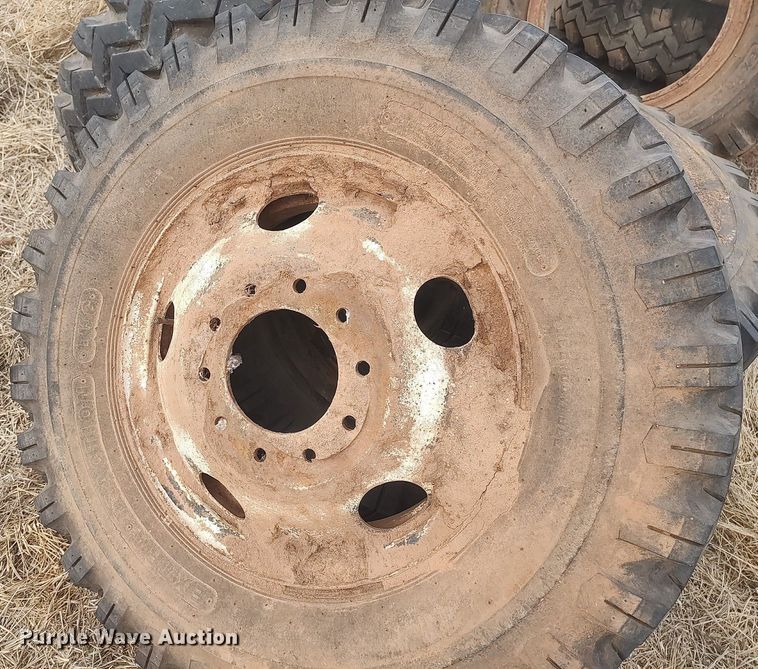 image for item DQ0453 (8) 9.00-20 tires and wheels