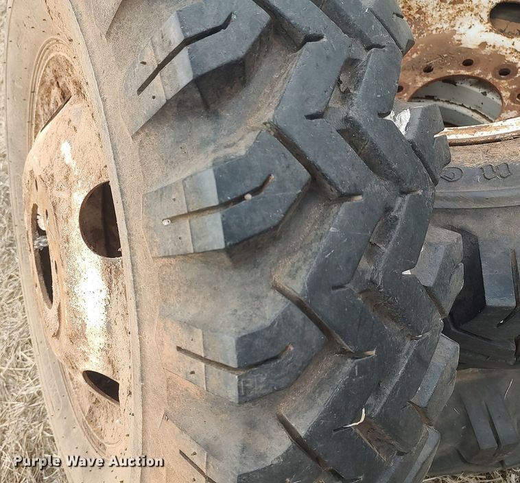 image for item DQ0453 (8) 9.00-20 tires and wheels