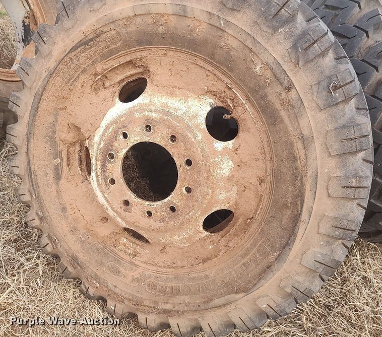 image for item DQ0453 (8) 9.00-20 tires and wheels