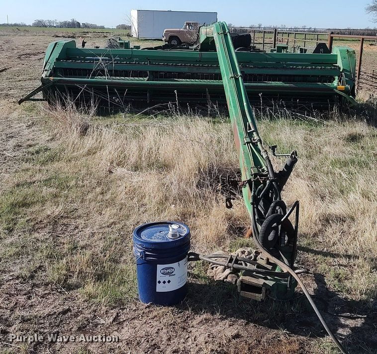 image for item DQ0464 1998 John Deere 1600A  swather / windrower