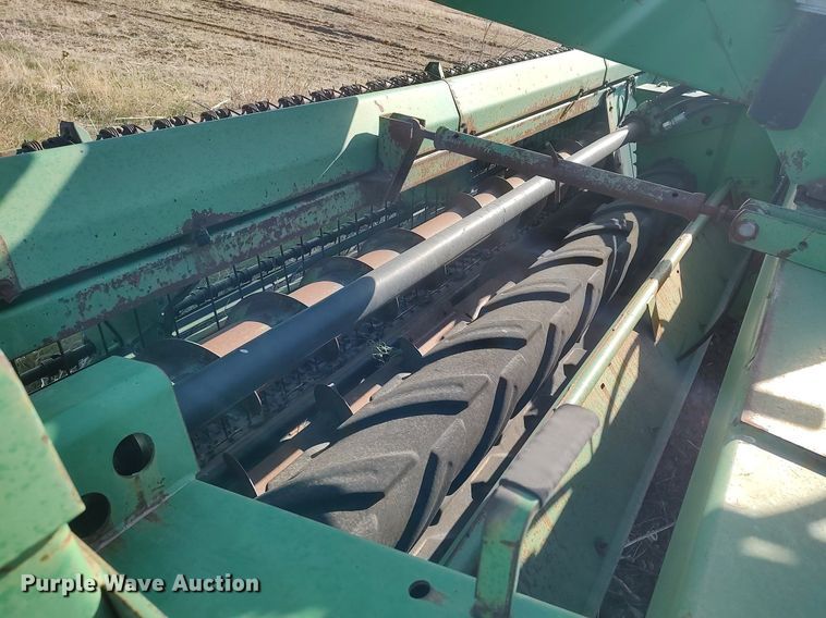 image for item DQ0464 1998 John Deere 1600A  swather / windrower