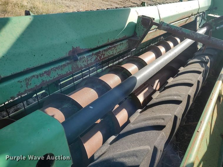 image for item DQ0464 1998 John Deere 1600A  swather / windrower