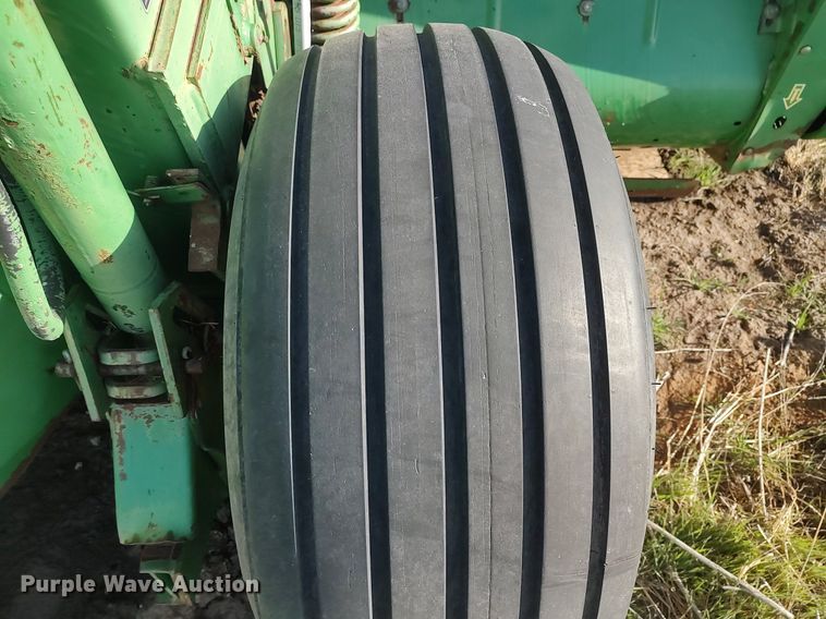 image for item DQ0464 1998 John Deere 1600A  swather / windrower