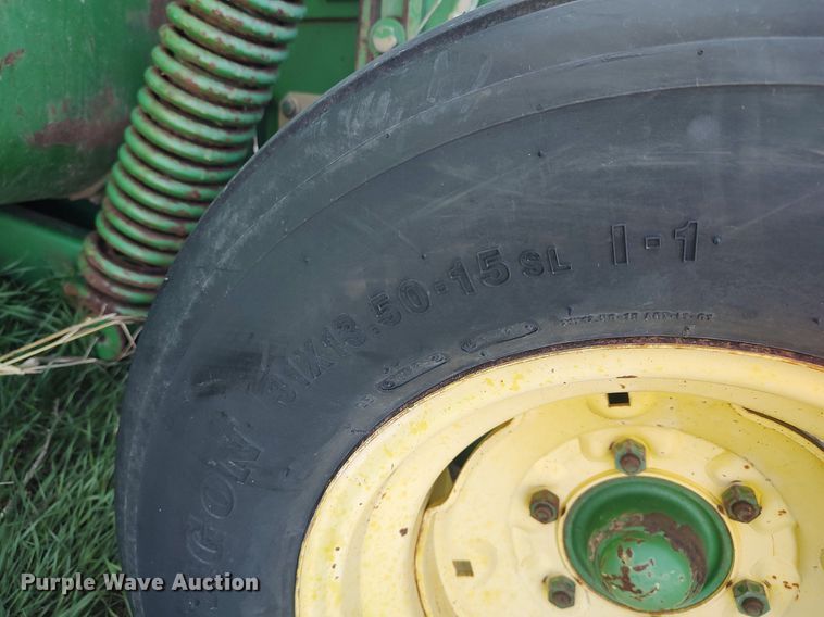 image for item DQ0464 1998 John Deere 1600A  swather / windrower