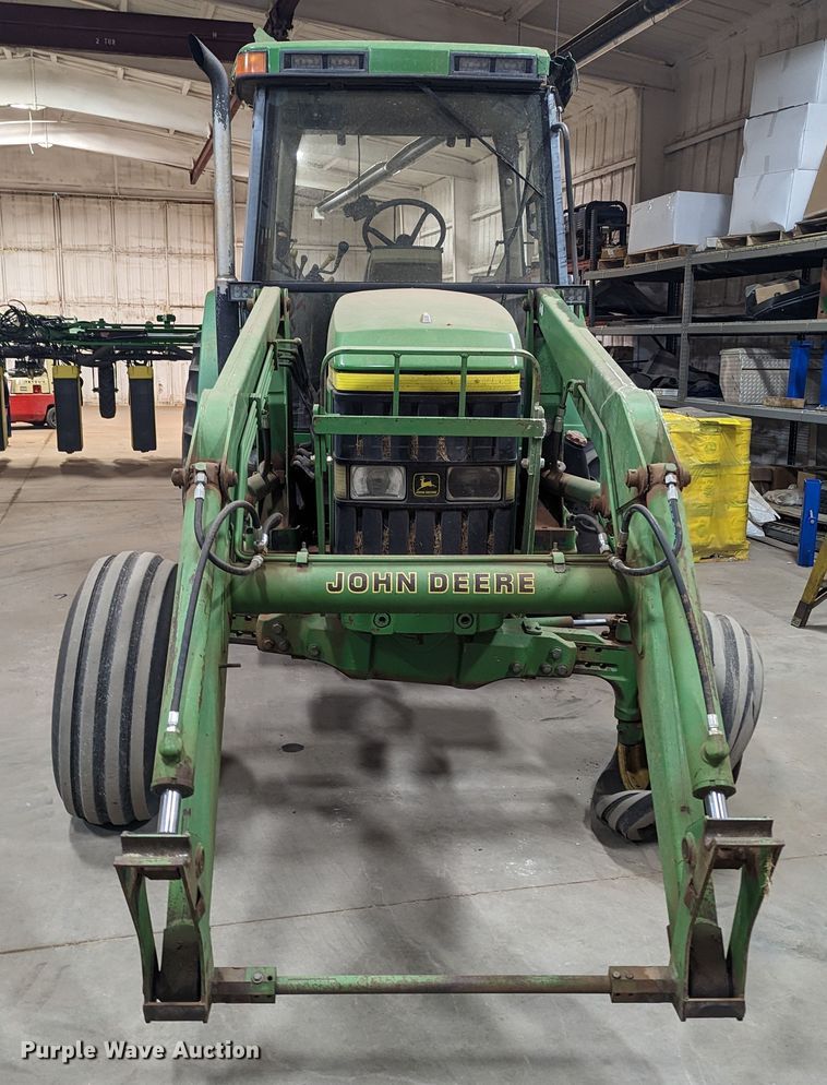 image for item MN9841 1999 John Deere 7210  tractor