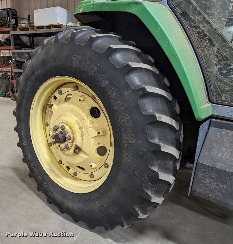 image for item MN9841 1999 John Deere 7210  tractor