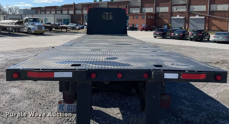 image for item LJ9545 2000 Sterling L7500  flatbed truck