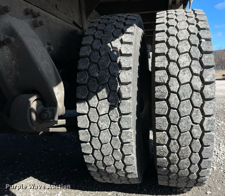 image for item LJ9545 2000 Sterling L7500  flatbed truck