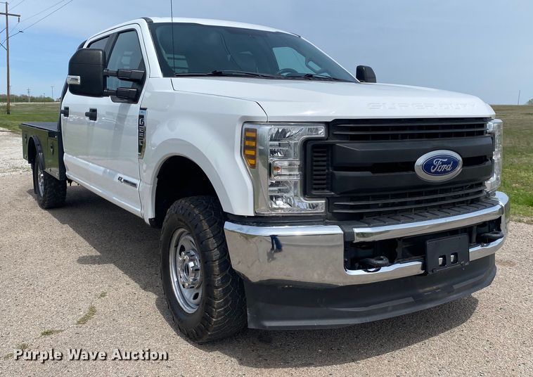 image for item DL7147 2019  Ford F250 Super Duty  Crew Cab flatbed pickup truck