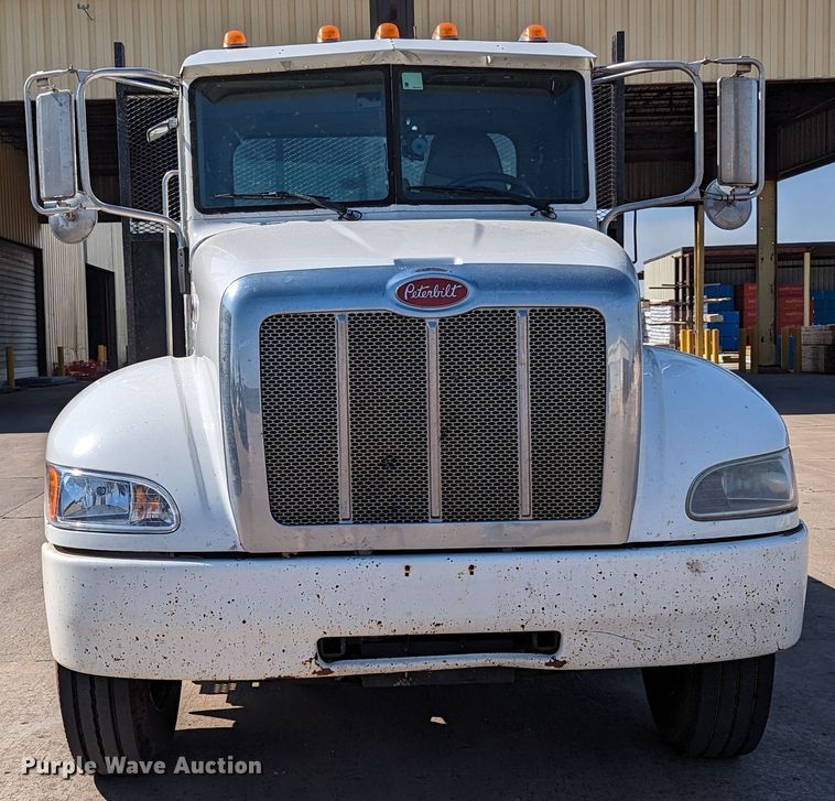 image for item MN9874 2014 Peterbilt 330  dump flatbed truck