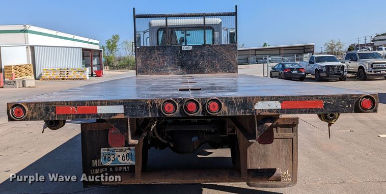 image for item MN9874 2014 Peterbilt 330  dump flatbed truck