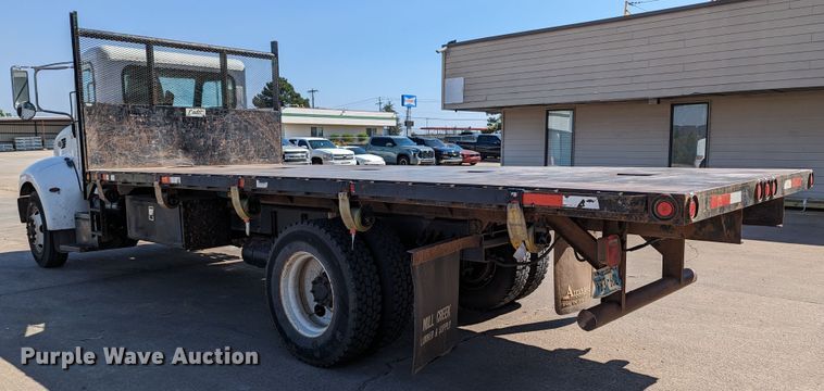 image for item MN9874 2014 Peterbilt 330  dump flatbed truck