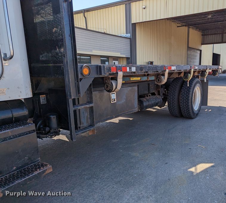 image for item MN9874 2014 Peterbilt 330  dump flatbed truck